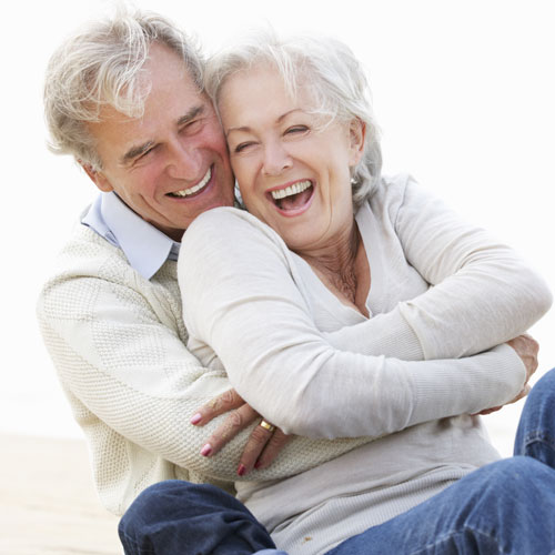 Happy Couple With Dental Implants