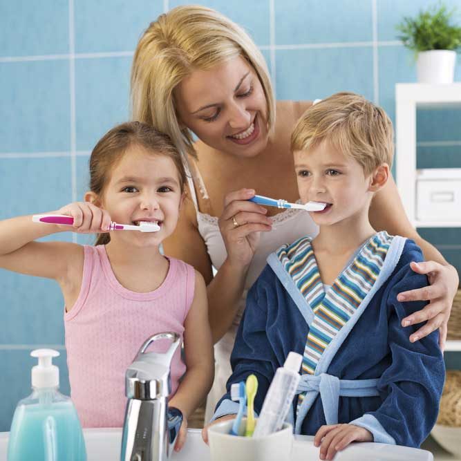 Mom & Children Brushing Teeth
